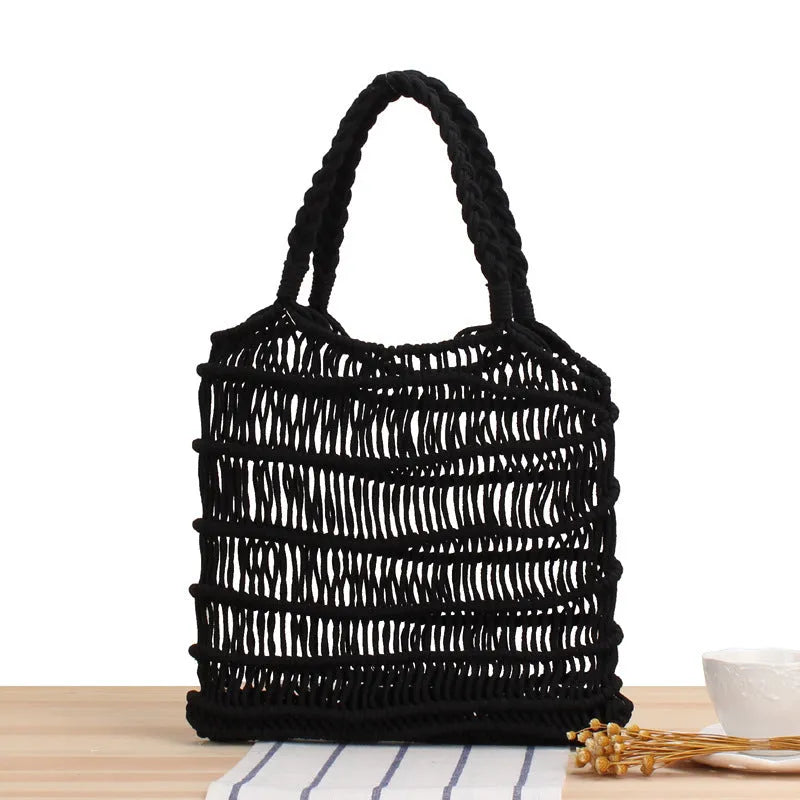 Women's medium square straw beach bag with woven design and double soft handles in neutral colours