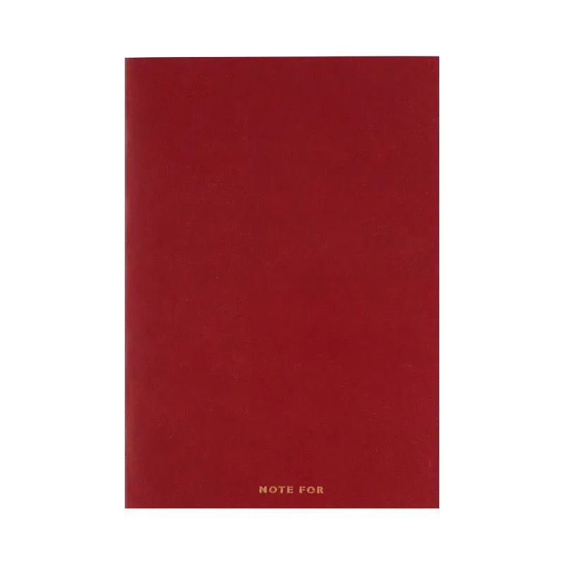 Red imitation leather hand book grid notebook showing inner core dot matrix pages with bronze detailing