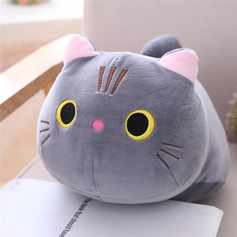 Soft grey fat cat plush doll filled with down cotton on a white background.