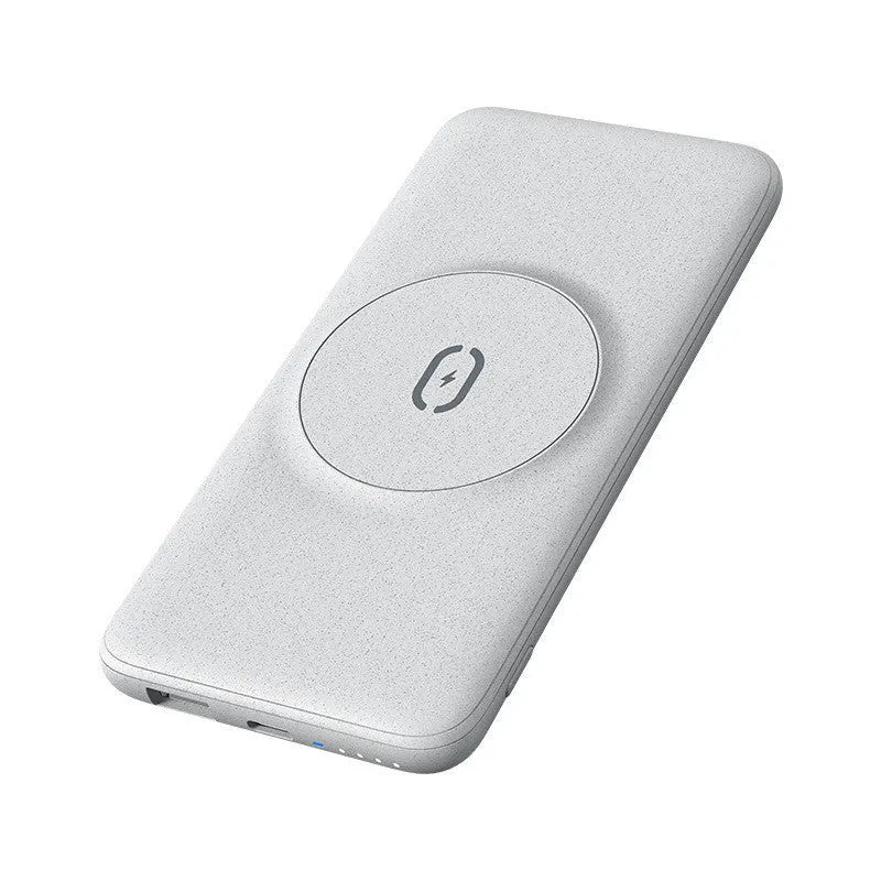 Mint green Maiduo MagSafe power bank with back clip attached to an iPhone, showing magnetic wireless charging.