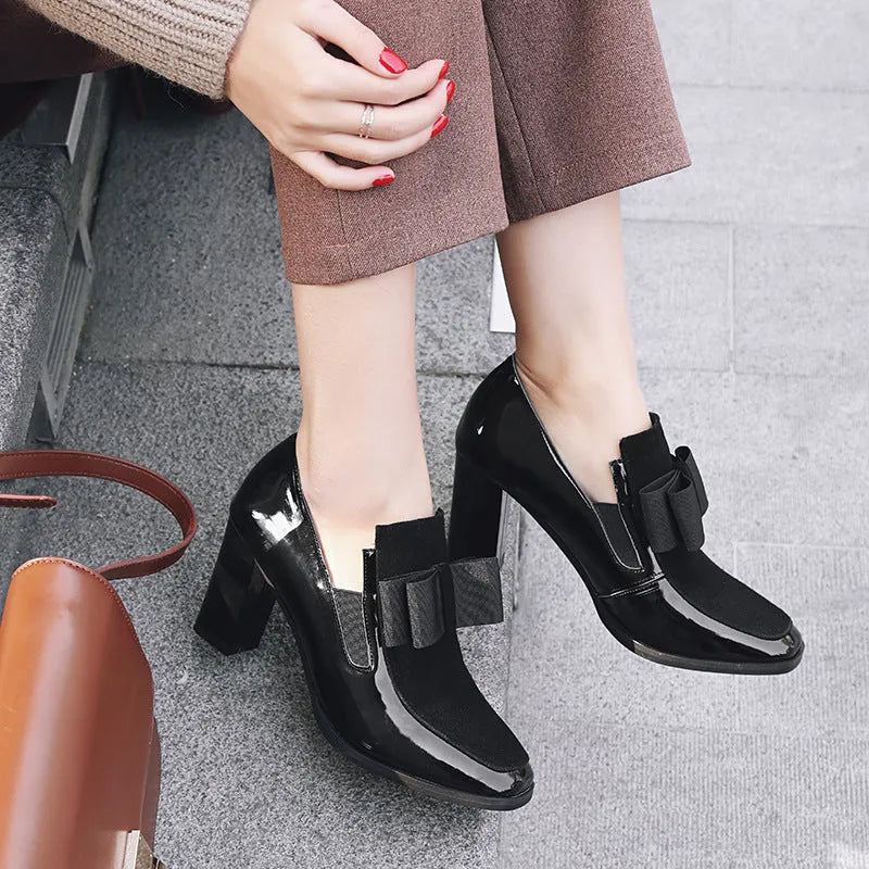 Black and wine red women's leather high heels with a thick square heel and square toe.