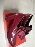 Black and wine red women's leather high heels with a thick square heel and square toe.