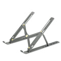 Aluminium alloy folding laptop heightening bracket in black on a desk with a notebook