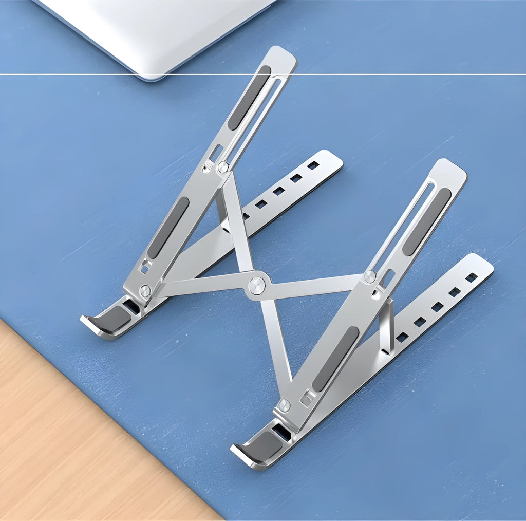 Aluminium alloy folding laptop heightening bracket in black on a desk with a notebook