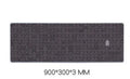 Grey cloth mouse wrist pad on desktop with non-slip underside