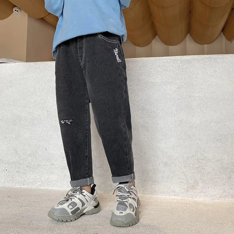 Boys' Korean-style cotton spandex jeans in black and blue for spring autumn, sizes 110cm to 160cm