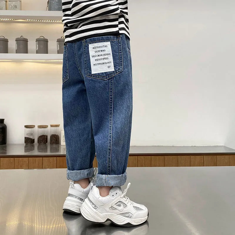 Boys' Korean-style cotton spandex jeans in black and blue for spring autumn, sizes 110cm to 160cm