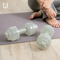 Fitness water dumbbell in light gray with water injection cap, 26cm PP material for home strength training