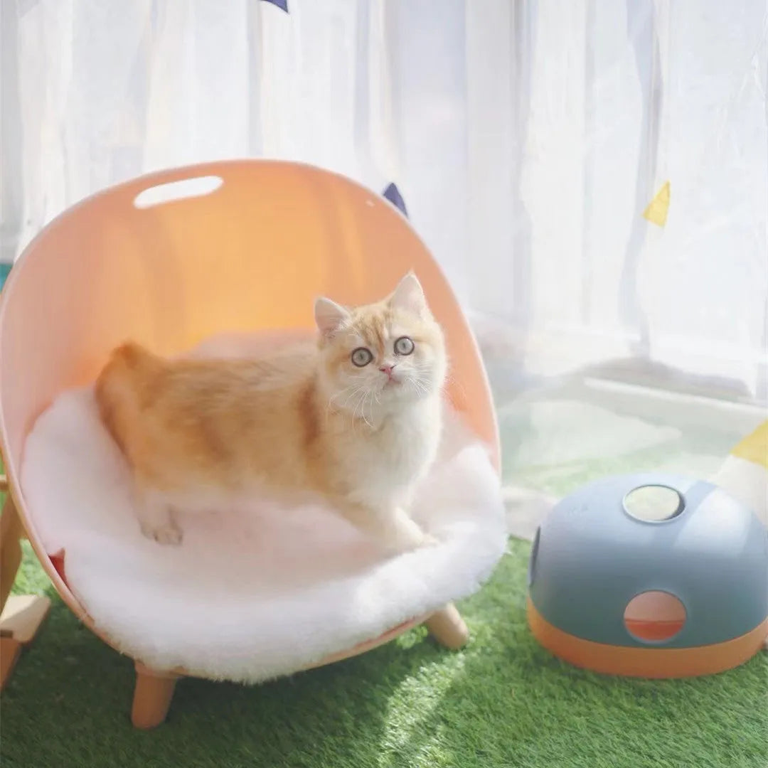 Cat turntable toy in PP and TPE with roller ball, shown in pink purple, blue grey, and avocado green