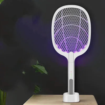 Rechargeable handheld electric mosquito swatter with a safety net, USB charging cable, and charger base.