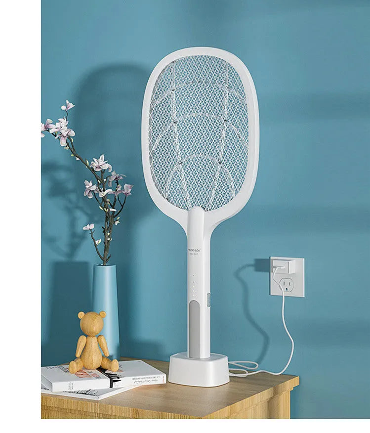 Rechargeable handheld electric mosquito swatter with a safety net, USB charging cable, and charger base.