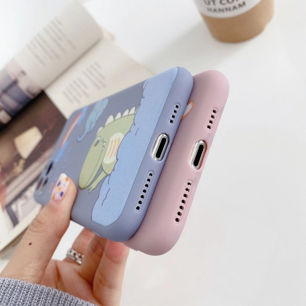 Blue cartoon dinosaur design on a soft TPU silicone case for an iPhone.