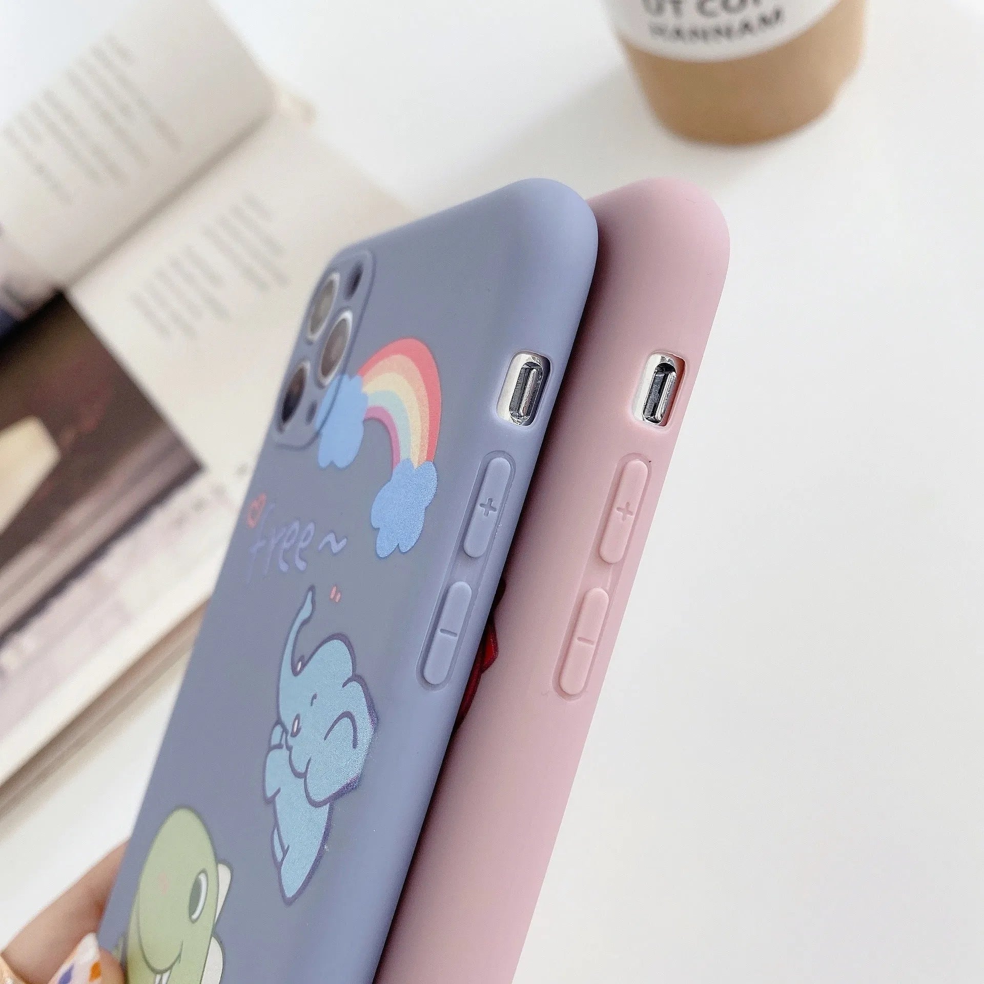 Blue cartoon dinosaur design on a soft TPU silicone case for an iPhone.