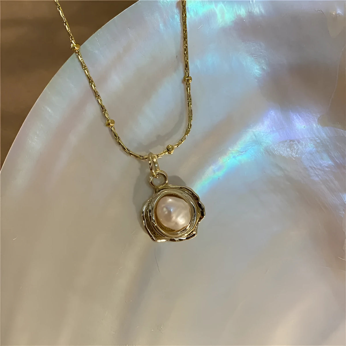 Golden freshwater pearl necklace with titanium steel element in a retro baroque style, single necklace