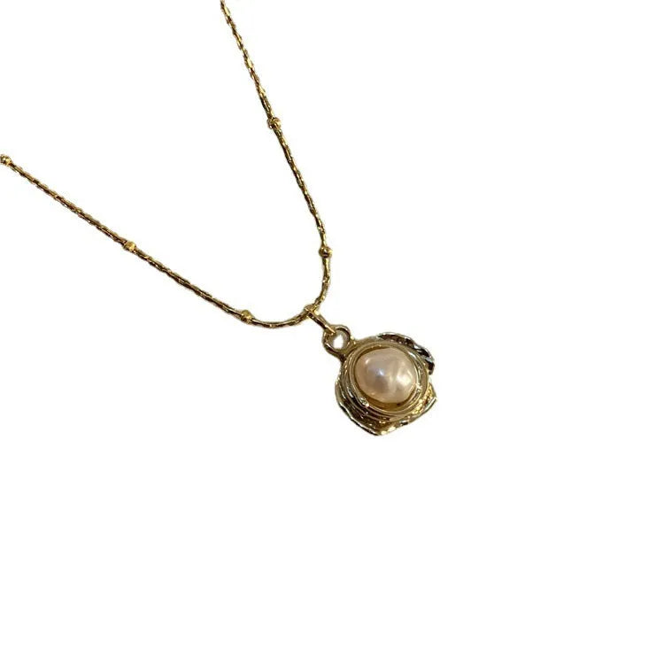 Golden freshwater pearl necklace with titanium steel element in a retro baroque style, single necklace