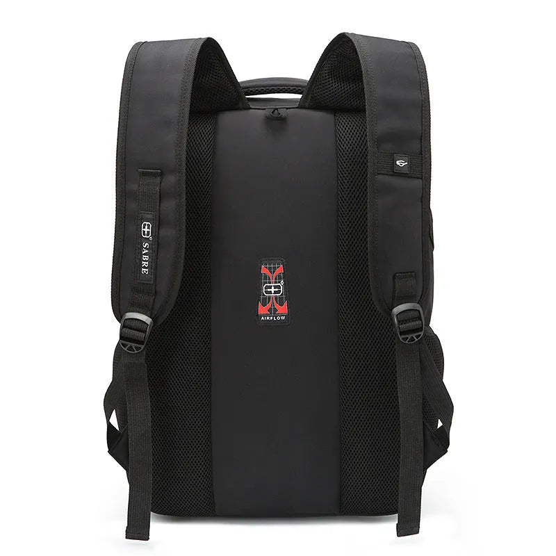 Black nylon backpack with USB port, padded laptop pocket for 15-17 inch, and anti-theft compartments