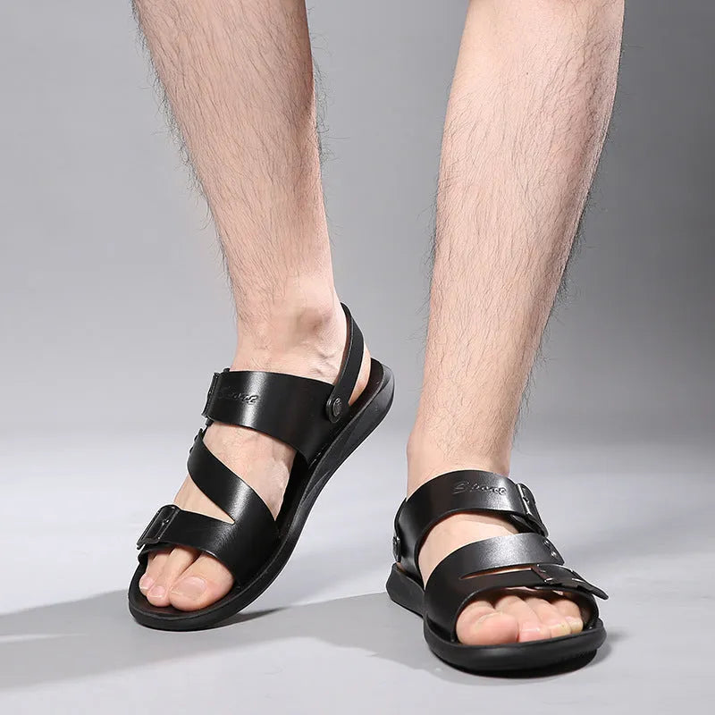 Pair of men's casual leather sandals with buckle fastening and open toe, shown in black or brown.