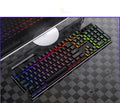 Wired computer keyboard and mouse set with gaming-style design on desk