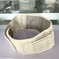 Black self-heating magnetic waist support belt fastened around a model's lower back.