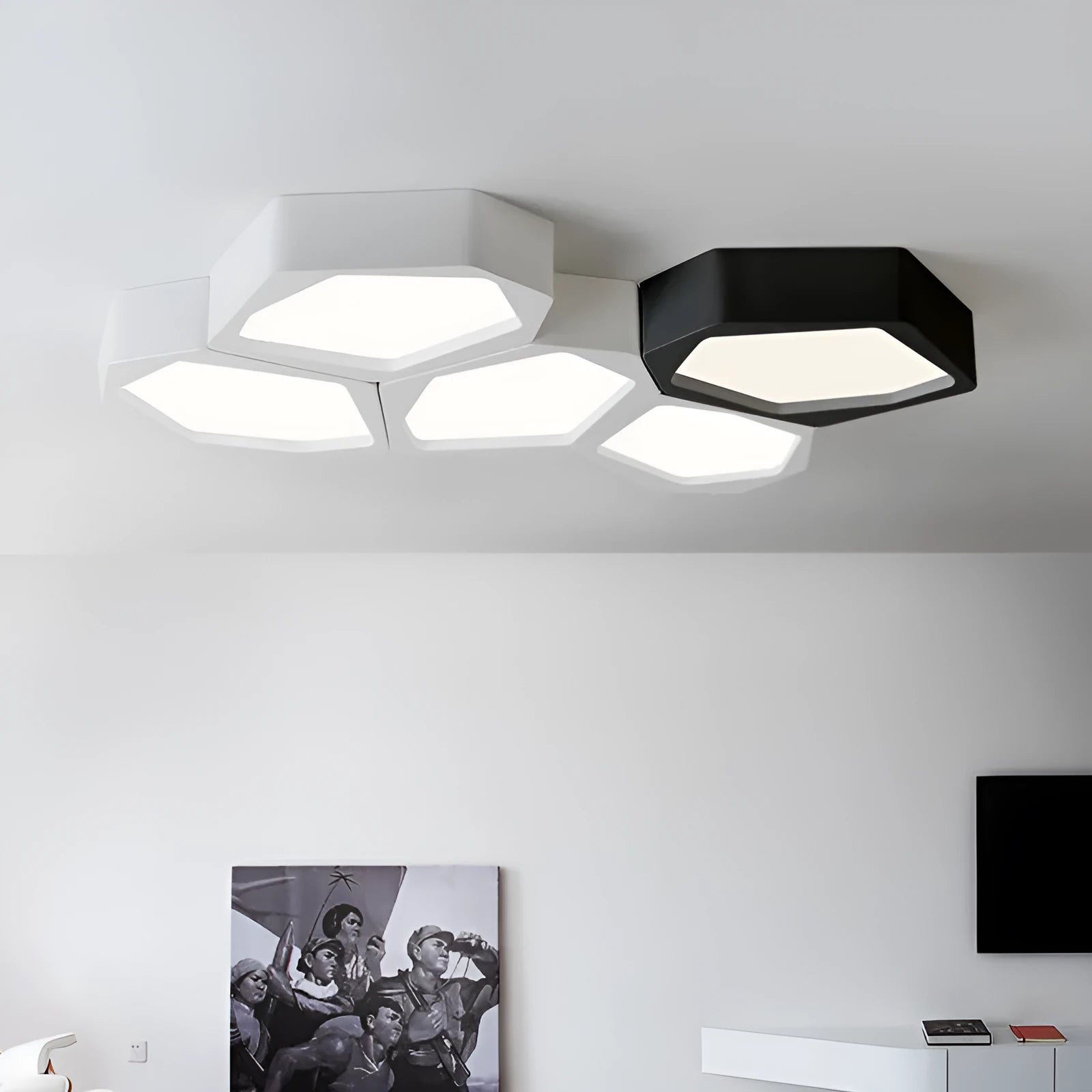 Geometric shaped iron wall light in black or white with remote control for dimming.