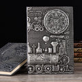 European relief retro notepad with embossed leather cover in green bronze, showing open pages.