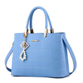 Medium women's PU handbag with hair ball charm, zip top, soft handle, horizontal square shape, eight colours