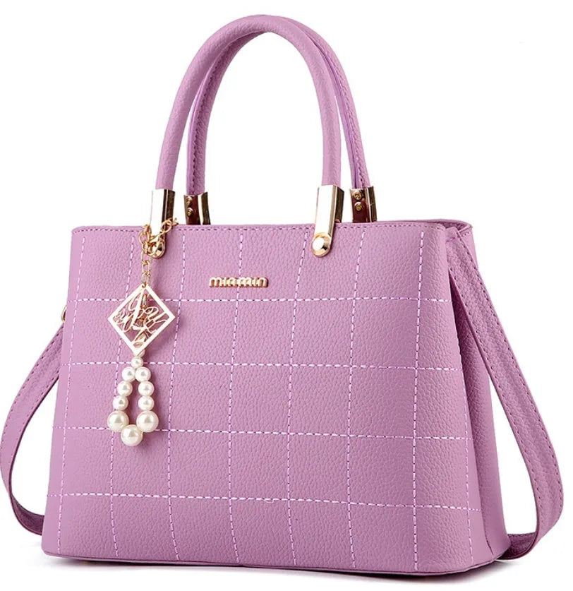 Medium women's PU handbag with hair ball charm, zip top, soft handle, horizontal square shape, eight colours