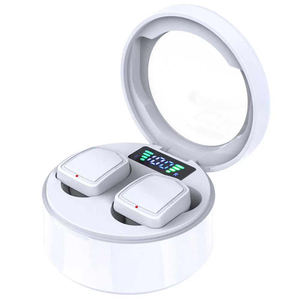 Black true wireless Bluetooth earbuds nestled in their open charging case with silicone ear tips visible.