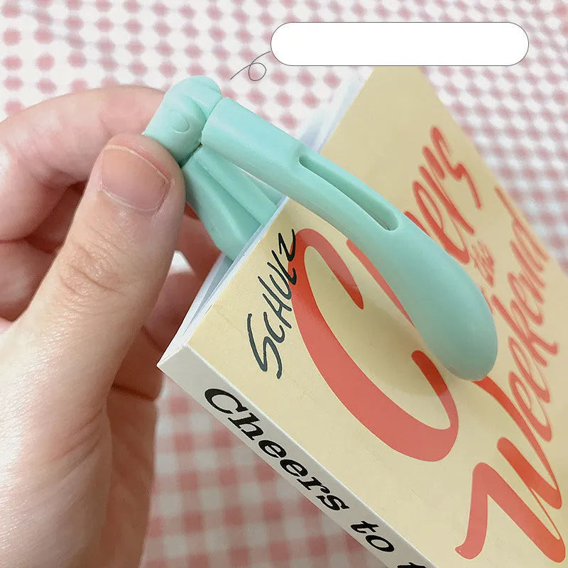 Folding book light in blue colour with battery operation for bedside reading