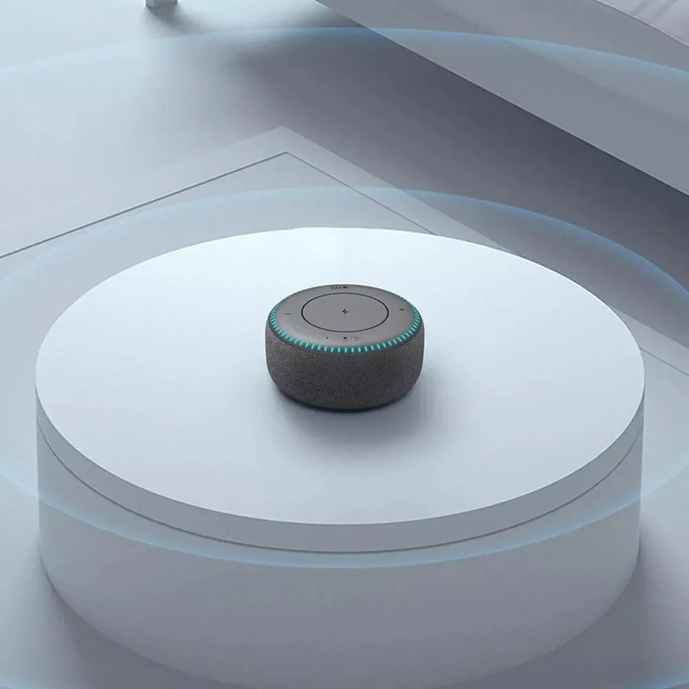 Black Bluetooth speaker with wireless charging top and white noise generation function