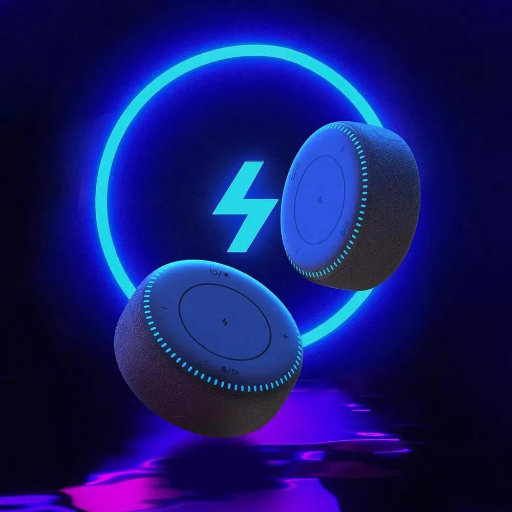 Black Bluetooth speaker with wireless charging top and white noise generation function