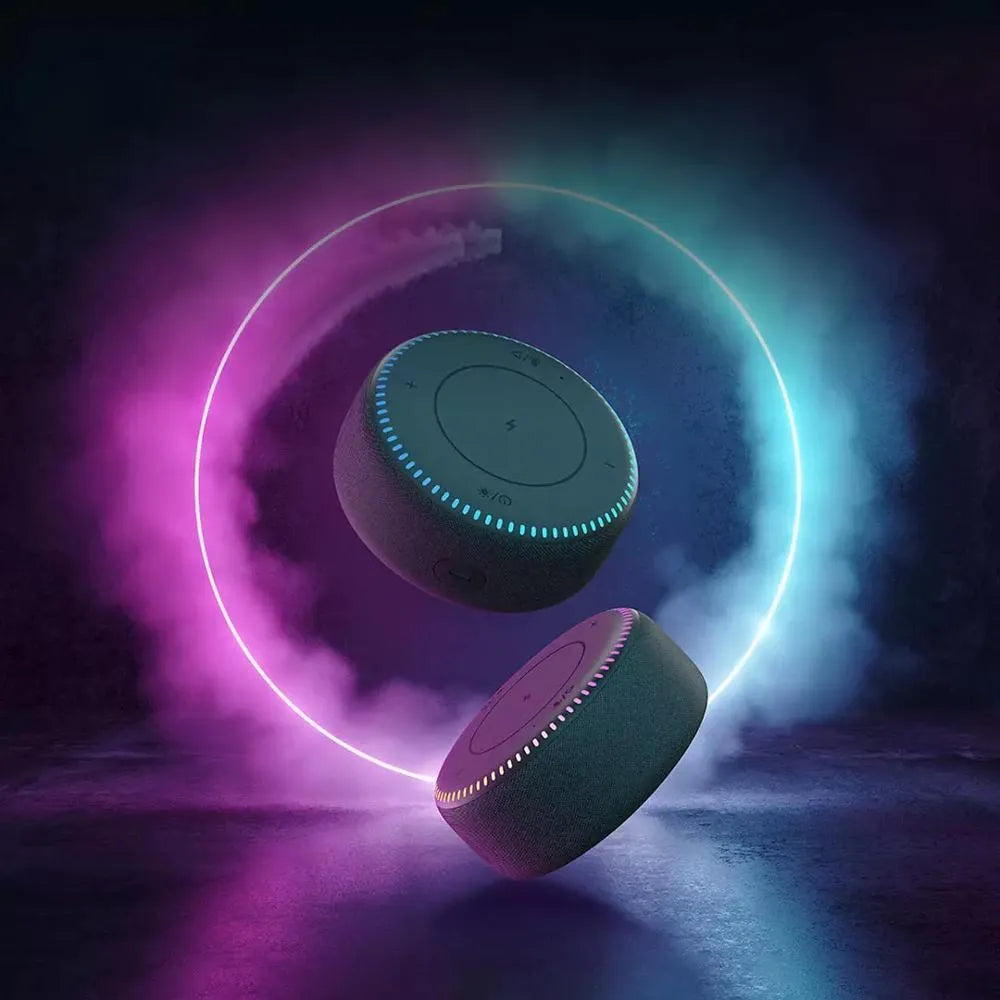 Black Bluetooth speaker with wireless charging top and white noise generation function