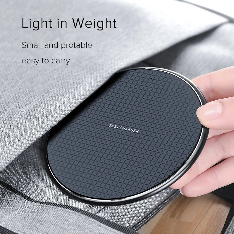 Round black wireless phone charger with ultra-thin aluminium alloy body and Qi receiver
