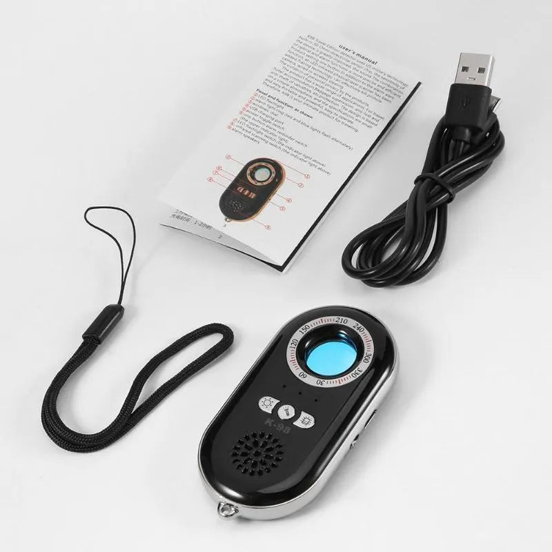 Compact black wireless signal detector for anti-theft monitoring and pinhole camera detection.