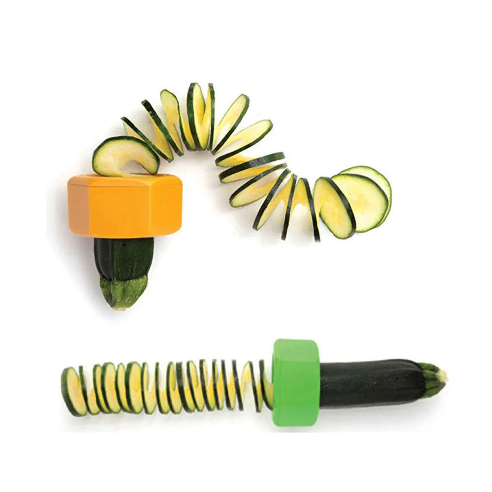 Yellow and green plastic spiral vegetable cutter on a kitchen worktop.