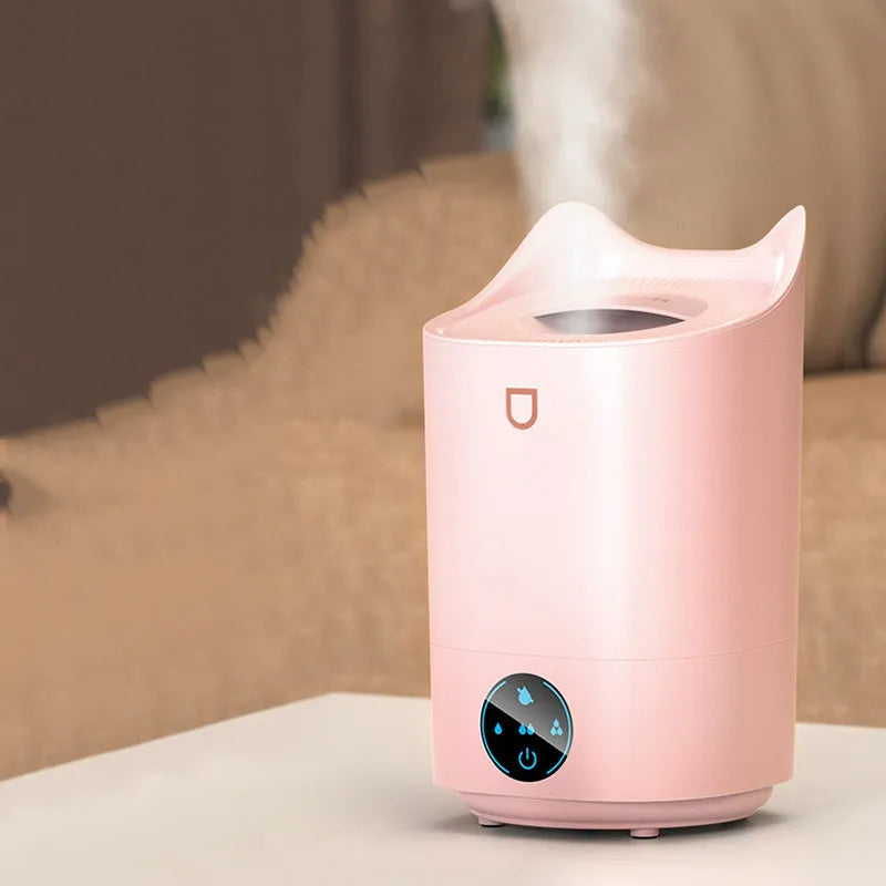 Double spray humidifier with three fog outlets in coral pink or white colour with USB power cable