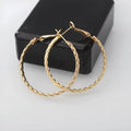 Geometric metal earring for women with electroplated finish, shown in Golden or Silver colour option