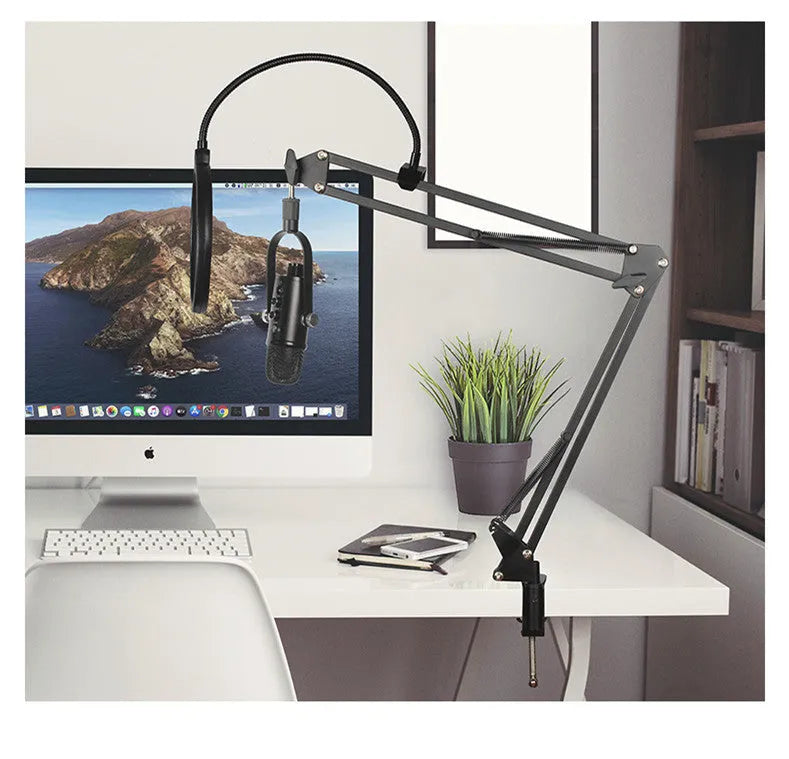Black BM-86PRO USB condenser microphone on a metal stand with sponge pop filter.
