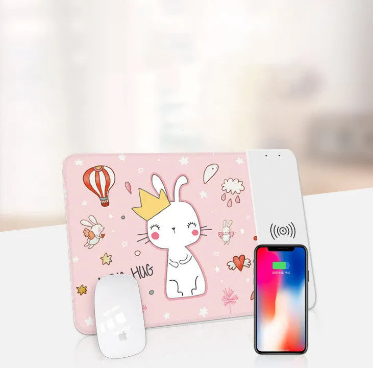 Colourful cartoon design wireless charging mouse pad with RGB lighting on a desk