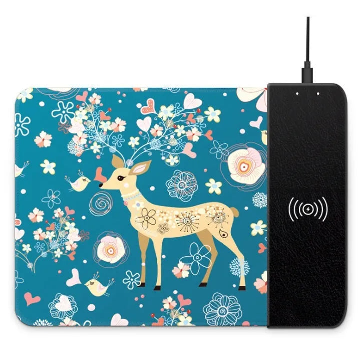 Colourful cartoon design wireless charging mouse pad with RGB lighting on a desk
