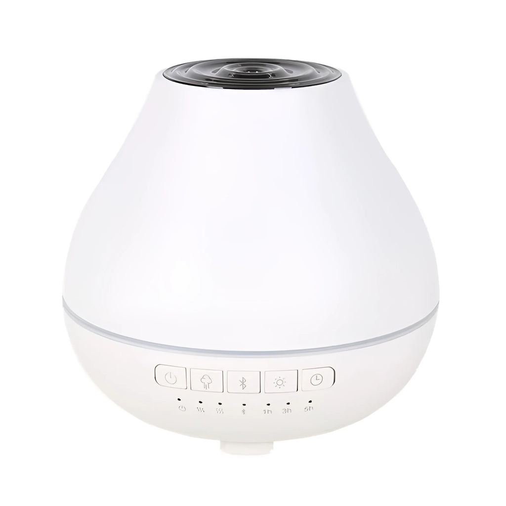 Round white Bluetooth humidifier and essential oil aroma diffuser with night light on a wooden surface.