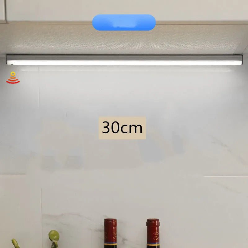 Rechargeable hand-scan activated LED strip light with magnetic mounting for cabinet interiors