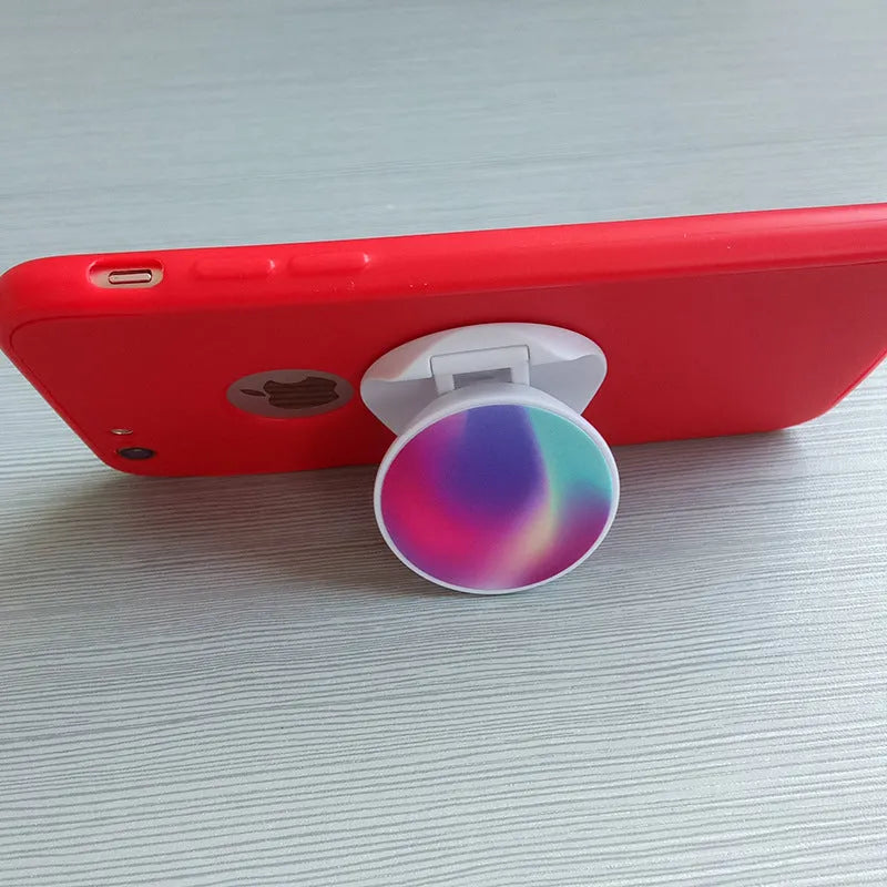Folding mobile phone stand with thermal transfer aluminium finish in desktop use position