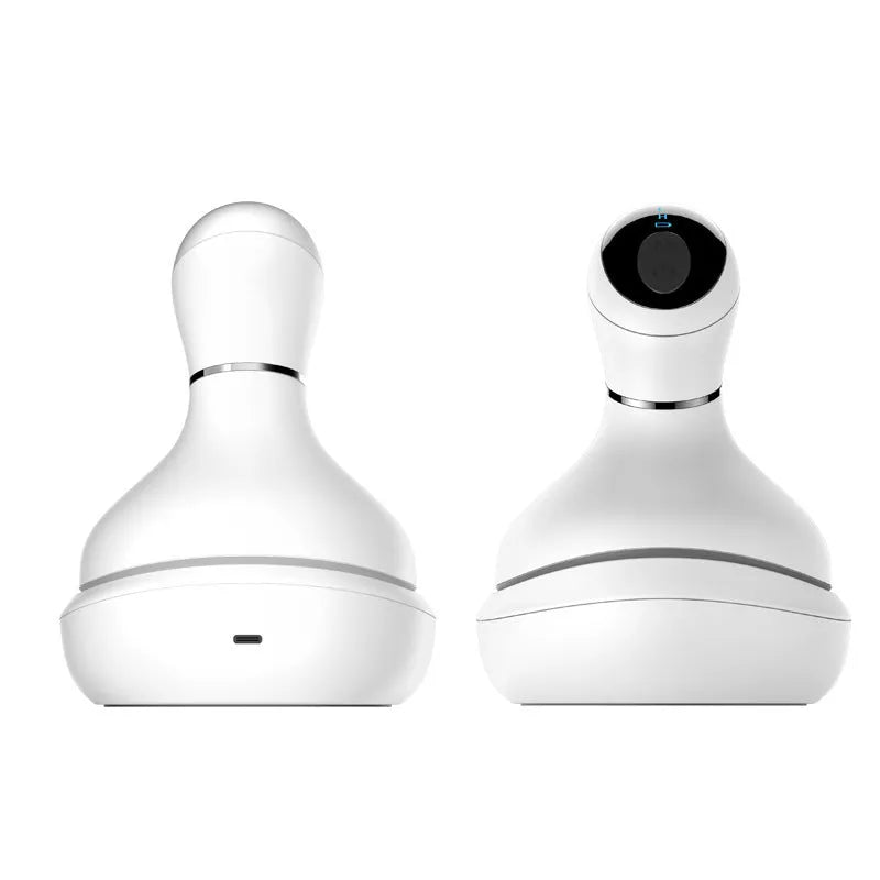 White rechargeable waterproof electric scalp head massager with wireless remote control on a surface
