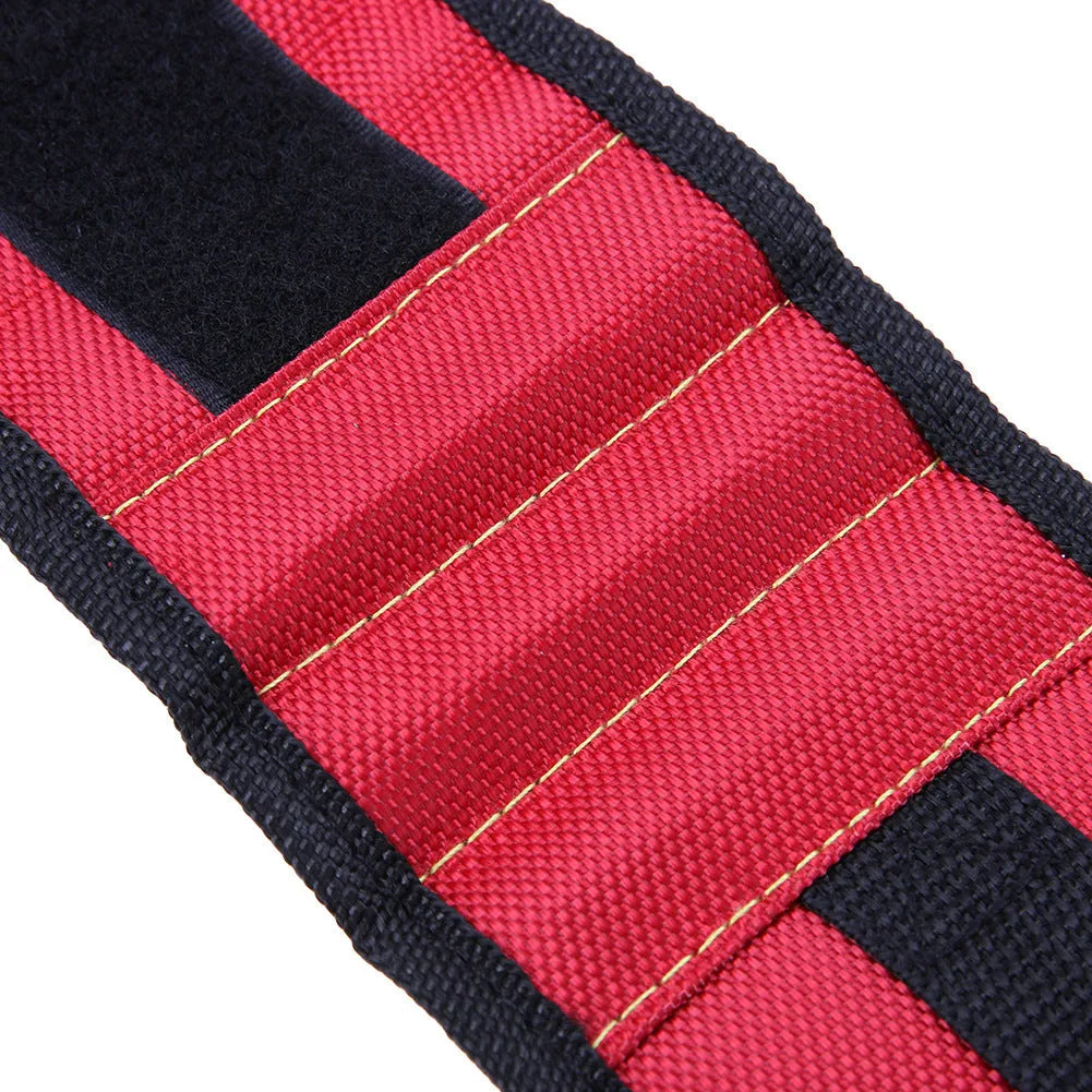 Fifteen-compartment powerful magnetic wristband in nylon, blue colour, with rows of magnets holding screws and nails