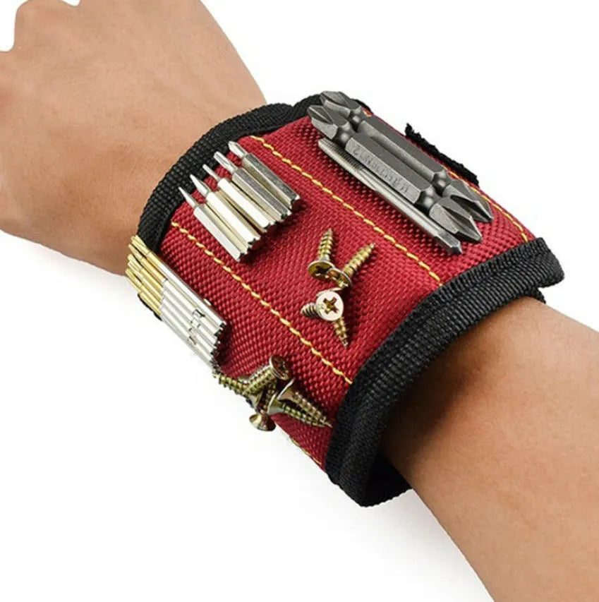 Fifteen-compartment powerful magnetic wristband in nylon, blue colour, with rows of magnets holding screws and nails