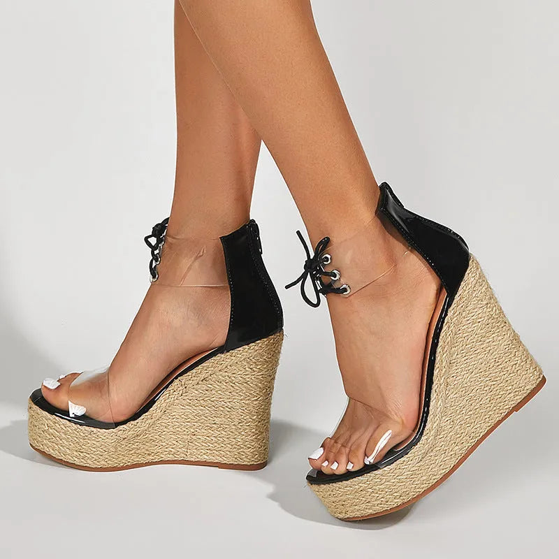 Black women's wedge sandals with hemp rope detail and a super high wedge heel platform.