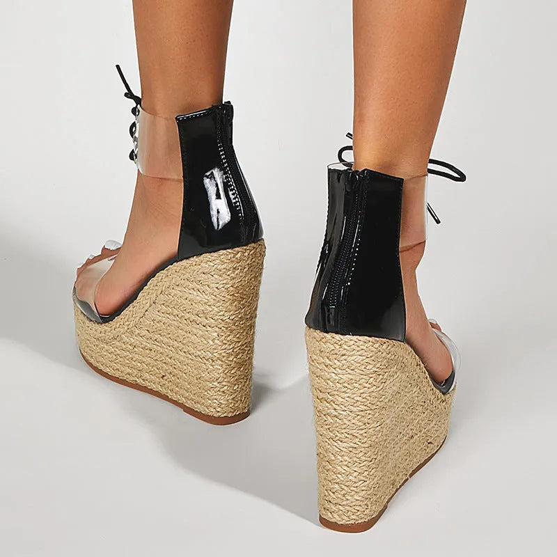 Black women's wedge sandals with hemp rope detail and a super high wedge heel platform.