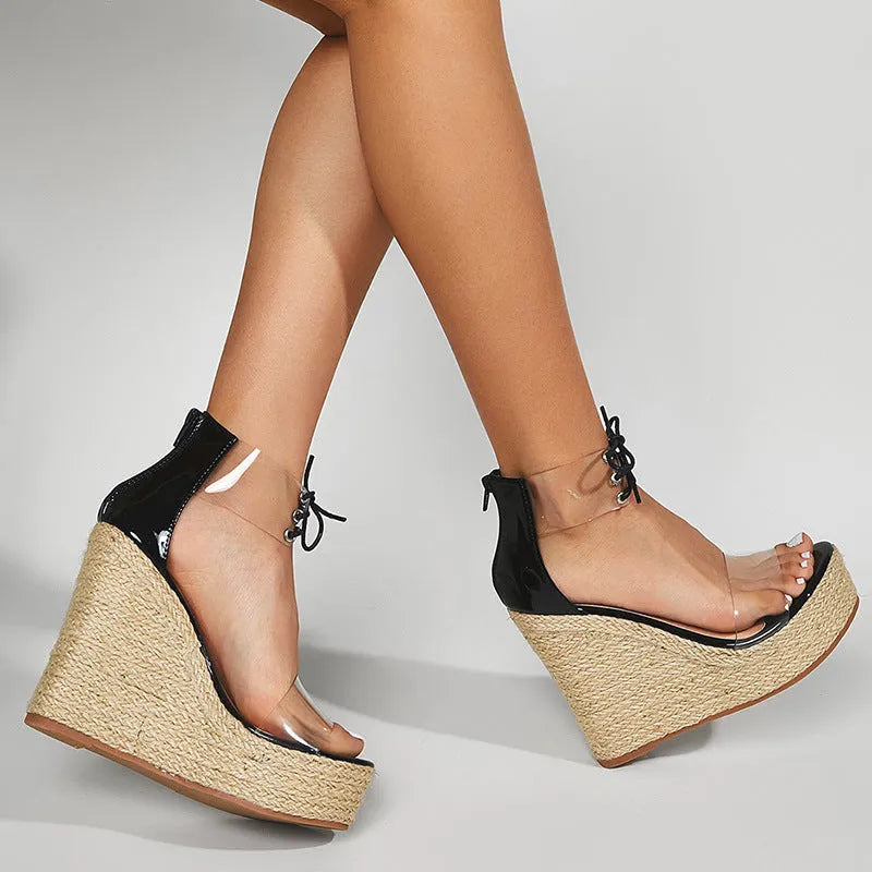 Black women's wedge sandals with hemp rope detail and a super high wedge heel platform.