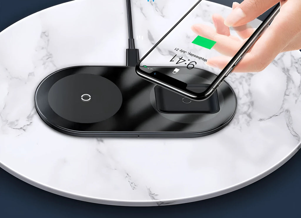 Baseus black wireless charger with iPhone on stand and AirPods case charging on separate spot